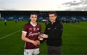 12 May 2023; Pictured is Aaron Niland of Galway, being presented with the Electric Ireland Player of the Match award by TG4 analyst Tom Kenny following his performance for Galway in today’s Electric Ireland Leinster Minor Hurling Championship Final versus Kilkenny at Laois Hire O’Moore Park in Portlaoise, Laois. Follow all the action in the Electric Ireland GAA Minor Championships on social media @ElectricIreland and via the hashtag #ThisIsMajor, or for more information go to https://www.electricireland.ie/gaa-minor-championships. Photo by Eóin Noonan/Sportsfile