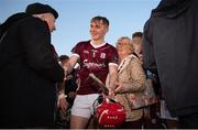12 May 2023; Dylan Quirke of Galway celebrates with his grandfather's partner &quot;granny Noreen&quot; after the Electric Ireland Leinster GAA Hurling Minor Championship Final match between Kilkenny and Galway at Laois Hire O’Moore Park in Portlaoise, Laois. Photo by Stephen Marken/Sportsfile