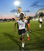 12 May 2023; Wasiri Williams, below, and Archie Davies of Dundalk celebrate after the SSE Airtricity Men's Premier Division match between Dundalk and Cork City at Oriel Park in Dundalk, Louth. Photo by Ramsey Cardy/Sportsfile