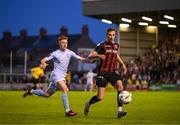 12 May 2023; Kacper Radkowski of Bohemians in action against Brandon Kavanagh of Derry City during the SSE Airtricity Men's Premier Division match between Bohemians and Derry City at Dalymount Park in Dublin. Photo by Stephen McCarthy/Sportsfile