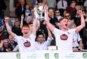 13 May 2023; Kildare joint captains Harry O'Neill, left, and Shane Farrell lift the cup following the Eirgrid GAA Football All-Ireland U20 Championship Final between Kildare and Sligo at Kingspan Breffni in Cavan. Photo by Stephen McCarthy/Sportsfile