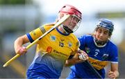 13 May 2023; Eimear Kelly of Clare is tackled by Julieanne Bourke of Tipperary during the Munster Senior Camogie Championship Final between Clare and Tipperary at FBD Semple Stadium in Thurles, Tipperary. Photo by Ray McManus/Sportsfile