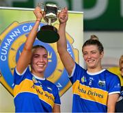 13 May 2023; The Tipperary joint captains Clodagh Quirke, left, and Karen Kennedy celebrate with the cup after the Munster Senior Camogie Championship Final between Clare and Tipperary at FBD Semple Stadium in Thurles, Tipperary. Photo by Ray McManus/Sportsfile