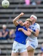 13 May 2023; Paddy Lynch of Cavan in action against Trevor Collins of Laois during the Tailteann Cup Group 1 Round 1 match between Cavan and Laois at Kingspan Breffni in Cavan. Photo by Stephen McCarthy/Sportsfile