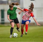 13 May 2023; Ellen Dolan of Peamount United is tackled by Chloe Hennigan of Treaty United during the SSE Airtricity Women's Premier Division match between Treaty United and Peamount United at Markets Field in Limerick. Photo by Tom Beary/Sportsfile