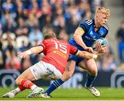 13 May 2023; Tommy O'Brien of Leinster is tackled by Mike Haley of Munster during the United Rugby Championship Semi-Final match between Leinster and Munster at the Aviva Stadium in Dublin. Photo by Harry Murphy/Sportsfile