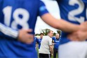 13 May 2023; Cavan manager Mickey Graham speaks to his players after the Tailteann Cup Group 1 Round 1 match between Cavan and Laois at Kingspan Breffni in Cavan. Photo by Stephen McCarthy/Sportsfile