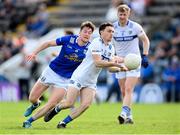 13 May 2023; Dylan Kavanagh of Laois in action against Oisin Kiernan of Cavan during the Tailteann Cup Group 1 Round 1 match between Cavan and Laois at Kingspan Breffni in Cavan. Photo by Stephen McCarthy/Sportsfile