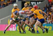 13 May 2023; Jamie Barron of Waterford is tackled by Cathal Malone supported by Ryan Taylor, left, and John Conlon of Clare, right, during the Munster GAA Hurling Senior Championship Round 3 match between Waterford and Clare at FBD Semple Stadium in Thurles, Tipperary. Photo by Ray McManus/Sportsfile