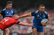 13 May 2023; Dave Kearney of Leinster is tackled by Keith Earls of Munster during the United Rugby Championship Semi-Final match between Leinster and Munster at the Aviva Stadium in Dublin. Photo by Brendan Moran/Sportsfile