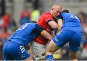 13 May 2023; Keith Earls of Munster is tackled by Robbie Henshaw, left, and Harry Byrne of Leinster during the United Rugby Championship Semi-Final match between Leinster and Munster at the Aviva Stadium in Dublin. Photo by Seb Daly/Sportsfile