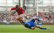 13 May 2023; Jack Crowley of Munster is tackled by Luke McGrath of Leinster during the United Rugby Championship Semi-Final match between Leinster and Munster at the Aviva Stadium in Dublin. Photo by Seb Daly/Sportsfile
