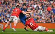 13 May 2023; Robbie Henshaw of Leinster is tackled by Jean Kleyn and Gavin Coombes of Munster during the United Rugby Championship Semi-Final match between Leinster and Munster at the Aviva Stadium in Dublin. Photo by Brendan Moran/Sportsfile