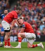 13 May 2023; (EDITOR'S NOTE; Image contains graphic content) Munster captain Peter O'Mahony, left, attempts tp stop the bleeding on teammate Ben Healy during the United Rugby Championship Semi-Final match between Leinster and Munster at the Aviva Stadium in Dublin. Photo by Brendan Moran/Sportsfile
