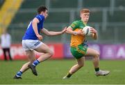 13 May 2023; Donal Gallagher of Donegal in action against Eanna Ward of Cavan during the Ulster GAA Minor Football Championship Quarter-Final match between Cavan and Donegal at Kingspan Breffni in Cavan. Photo by Stephen McCarthy/Sportsfile