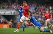 13 May 2023; Gavin Coombes of Munster is tackled by Luke McGrath of Leinster during the United Rugby Championship Semi-Final match between Leinster and Munster at the Aviva Stadium in Dublin. Photo by Brendan Moran/Sportsfile