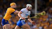 13 May 2023; Neil Montgomery of Waterford is tackled by David Fitzgerald of Clare during the Munster GAA Hurling Senior Championship Round 3 match between Waterford and Clare at FBD Semple Stadium in Thurles, Tipperary. Photo by Ray McManus/Sportsfile