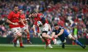 13 May 2023; Peter O'Mahony of Munster beats the tackle of Jack Conan of Leinster during the United Rugby Championship Semi-Final match between Leinster and Munster at the Aviva Stadium in Dublin. Photo by Brendan Moran/Sportsfile