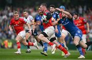 13 May 2023; Peter O'Mahony of Munster is tackled by Robbie Henshaw of Leinster during the United Rugby Championship Semi-Final match between Leinster and Munster at the Aviva Stadium in Dublin. Photo by Brendan Moran/Sportsfile