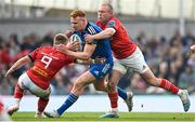 13 May 2023; Ciarán Frawley of Leinster is tackled by Craig Casey and Keith Earls of Munster during the United Rugby Championship Semi-Final match between Leinster and Munster at the Aviva Stadium in Dublin. Photo by Harry Murphy/Sportsfile