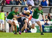 13 May 2023; Colman Kennedy of Tipperary in action against Conor Gray of Meath, left, and Padraic Harnan during the Tailteann Cup Group 2 Round 1 match between Meath and Tipperary at Páirc Tailteann in Navan, Meath. Photo by Tyler Miller/Sportsfile