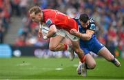 13 May 2023; Mike Haley of Munster is tackled by Robbie Henshaw of Leinster during the United Rugby Championship Semi-Final match between Leinster and Munster at the Aviva Stadium in Dublin. Photo by Brendan Moran/Sportsfile