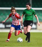 13 May 2023; Sadhbh Doyle of Peamount United in action against Katie Lawlee of Treaty United during the SSE Airtricity Women's Premier Division match between Treaty United and Peamount United at Markets Field in Limerick. Photo by Tom Beary/Sportsfile