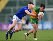 13 May 2023; Darragh Hennigan of Donegal in action against Aaron Shekleton of Cavan during the Ulster GAA Minor Football Championship Quarter-Final match between Cavan and Donegal at Kingspan Breffni in Cavan. Photo by Stephen McCarthy/Sportsfile