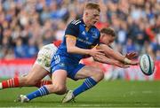 13 May 2023; Tommy O'Brien of Leinster in action against Mike Haley of Munster  during the United Rugby Championship Semi-Final match between Leinster and Munster at the Aviva Stadium in Dublin. Photo by Seb Daly/Sportsfile