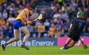 13 May 2023; Cathal Malone of Clare shoots past Waterford goalkeeper Billy Nolan to score his second goal in the 53rd minute during the Munster GAA Hurling Senior Championship Round 3 match between Waterford and Clare at FBD Semple Stadium in Thurles, Tipperary. Photo by Ray McManus/Sportsfile