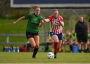 13 May 2023; Chloe Moloney of Peamount United in action against Kiara Kilbey of Treaty United during the SSE Airtricity Women's Premier Division match between Treaty United and Peamount United at Markets Field in Limerick. Photo by Tom Beary/Sportsfile