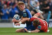 13 May 2023; Tommy O'Brien of Leinster knocks on under pressure from Mike Haley of Munster during the United Rugby Championship Semi-Final match between Leinster and Munster at the Aviva Stadium in Dublin. Photo by Harry Murphy/Sportsfile