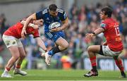 13 May 2023; Robbie Henshaw of Leinster in action against Rory Scannell, left, and Antoine Frisch of Munster during the United Rugby Championship Semi-Final match between Leinster and Munster at the Aviva Stadium in Dublin. Photo by Seb Daly/Sportsfile