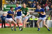 13 May 2023; Mathew Costello of Meath in action against Tipperary players, from left, Keith Ryan, Jack Kennedy and Paudie Feehan, during the Tailteann Cup Group 2 Round 1 match between Meath and Tipperary at Páirc Tailteann in Navan, Meath. Photo by Tyler Miller/Sportsfile
