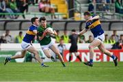 13 May 2023; Jack O'Connor of Meath in action against Keith Ryan of Tipperary, left, and Paudie Feehan during the Tailteann Cup Group 2 Round 1 match between Meath and Tipperary at Páirc Tailteann in Navan, Meath. Photo by Tyler Miller/Sportsfile