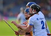 13 May 2023; Shane O'Donnell of Clare is tightly marked by Conor Gleeson, 2, and Conor Prunty of Waterford during the last few minutes of the Munster GAA Hurling Senior Championship Round 3 match between Waterford and Clare at FBD Semple Stadium in Thurles, Tipperary. Photo by Ray McManus/Sportsfile