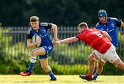 13 May 2023; Ciaran Fennessy of Leinster is tackled by Conor Horan of Munster during the Interprovincial Juniors match between Leinster and Munster at Waterford City RFC in Waterford. Photo by Matt Browne/Sportsfile