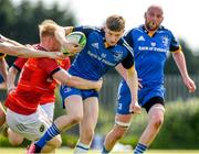 13 May 2023; Ciaran Fennessy of Leinster is tackled by Jack O'Connell of Munster during the Interprovincial Juniors match between Leinster and Munster at Waterford City RFC in Waterford. Photo by Matt Browne/Sportsfile