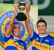 13 May 2023; The Tipperary joint captains Clodagh Quirke, left, and Karen Kennedy celebrate with the cup after the Munster Senior Camogie Championship Final between Clare and Tipperary at FBD Semple Stadium in Thurles, Tipperary. Photo by Ray McManus/Sportsfile