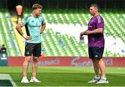 13 May 2023; Josh van der Flier of Leinster, left, and Munster defence coach Denis Leamy before the United Rugby Championship Semi-Final match between Leinster and Munster at the Aviva Stadium in Dublin. Photo by Brendan Moran/Sportsfile