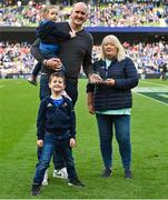 13 May 2023; Mary Carroll, on behalf of the Official Leinster Supporters Club, makes a presentation to former Leinster player Devin Toner, accompanied by his children Grace and Max, during the United Rugby Championship Semi-Final match between Leinster and Munster at the Aviva Stadium in Dublin. Photo by Brendan Moran/Sportsfile