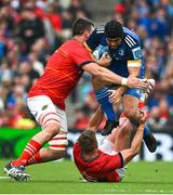 13 May 2023; Charlie Ngatai of Leinster is tackled by Jean Kleyn, left, and Mike Haley of Munster during the United Rugby Championship Semi-Final match between Leinster and Munster at the Aviva Stadium in Dublin. Photo by Brendan Moran/Sportsfile