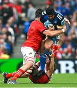 13 May 2023; Charlie Ngatai of Leinster is tackled by Jean Kleyn, left, and Mike Haley of Munster during the United Rugby Championship Semi-Final match between Leinster and Munster at the Aviva Stadium in Dublin. Photo by Brendan Moran/Sportsfile