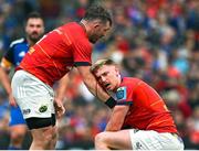 13 May 2023; (EDITOR'S NOTE; Image contains graphic content) Munster captain Peter O'Mahony, left, attempts to stop the bleeding on teammate Ben Healy during the United Rugby Championship Semi-Final match between Leinster and Munster at the Aviva Stadium in Dublin.  Photo by Brendan Moran/Sportsfile