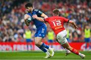 13 May 2023; Harry Byrne of Leinster is tackled by Jack Crowley of Munster during the United Rugby Championship Semi-Final match between Leinster and Munster at the Aviva Stadium in Dublin. Photo by Brendan Moran/Sportsfile
