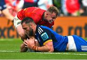 13 May 2023; Jason Jenkins of Leinster scores his side's first try despite the tackle of Craig Casey of Munster during the United Rugby Championship Semi-Final match between Leinster and Munster at the Aviva Stadium in Dublin. Photo by Brendan Moran/Sportsfile