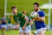 13 May 2023; Shane O'Connell of Tipperary in action against Adam O'Neill of Meath during the Tailteann Cup Group 2 Round 1 match between Meath and Tipperary at Páirc Tailteann in Navan, Meath. Photo by Tyler Miller/Sportsfile