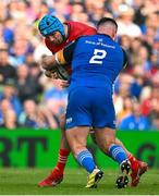 13 May 2023; Tadhg Beirne of Munster is tackled by Rónan Kelleher of Leinster during the United Rugby Championship Semi-Final match between Leinster and Munster at the Aviva Stadium in Dublin. Photo by Brendan Moran/Sportsfile