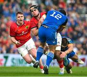 13 May 2023; Alex Kendellen of Munster is tackled by Charlie Ngatai of Leinster during the United Rugby Championship Semi-Final match between Leinster and Munster at the Aviva Stadium in Dublin. Photo by Brendan Moran/Sportsfile