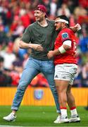 13 May 2023; Munster players Thomas Ahern, left, and Roman Salanoa celebrate after the United Rugby Championship Semi-Final match between Leinster and Munster at the Aviva Stadium in Dublin. Photo by Brendan Moran/Sportsfile